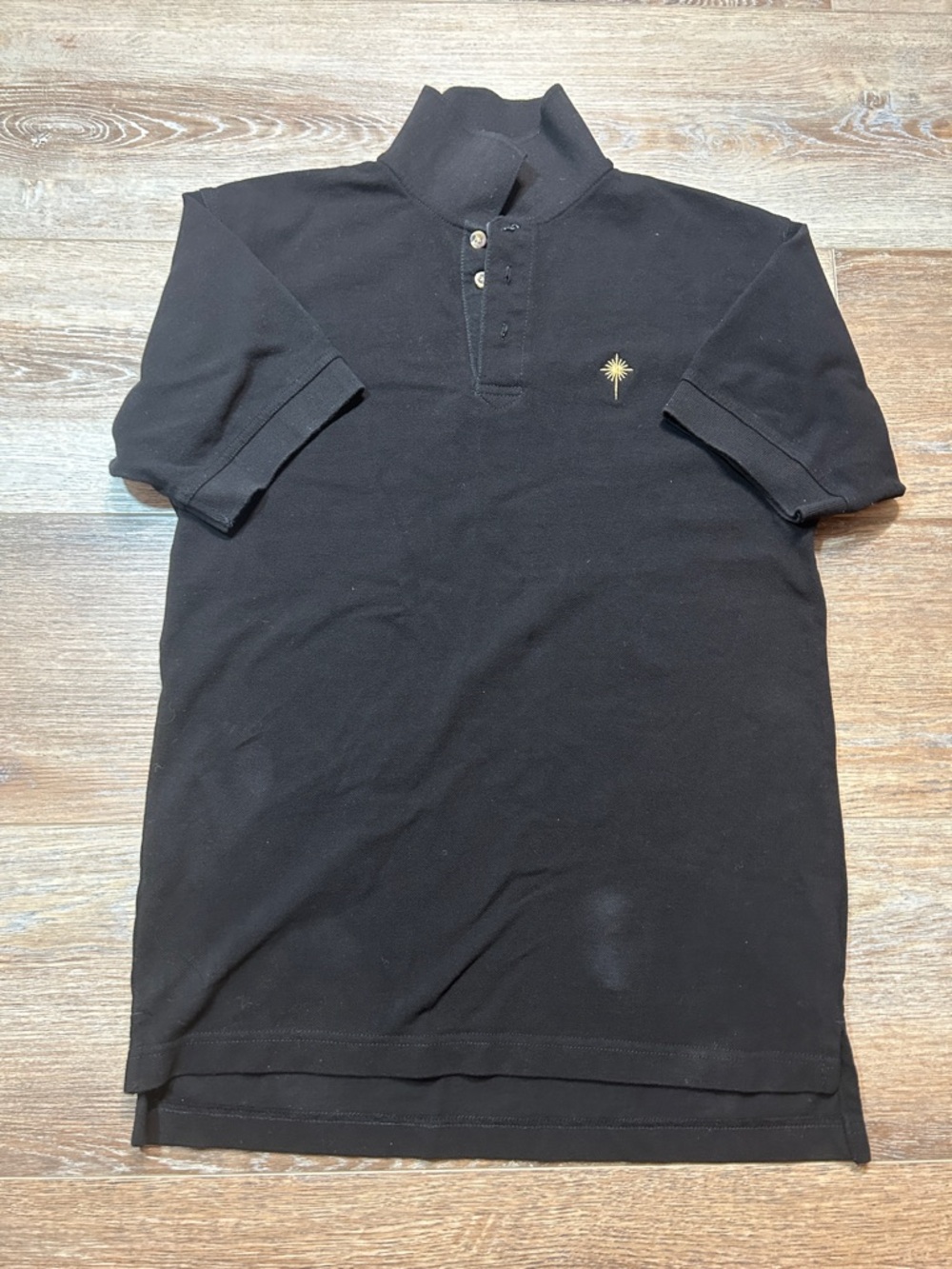 Men's Black Polo Shirt with Gold Embroidered Motif